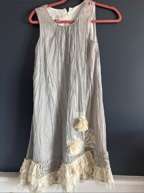 Ivory & Cream Ruffle Hem Sleeveless Dress with Floral Appliqués